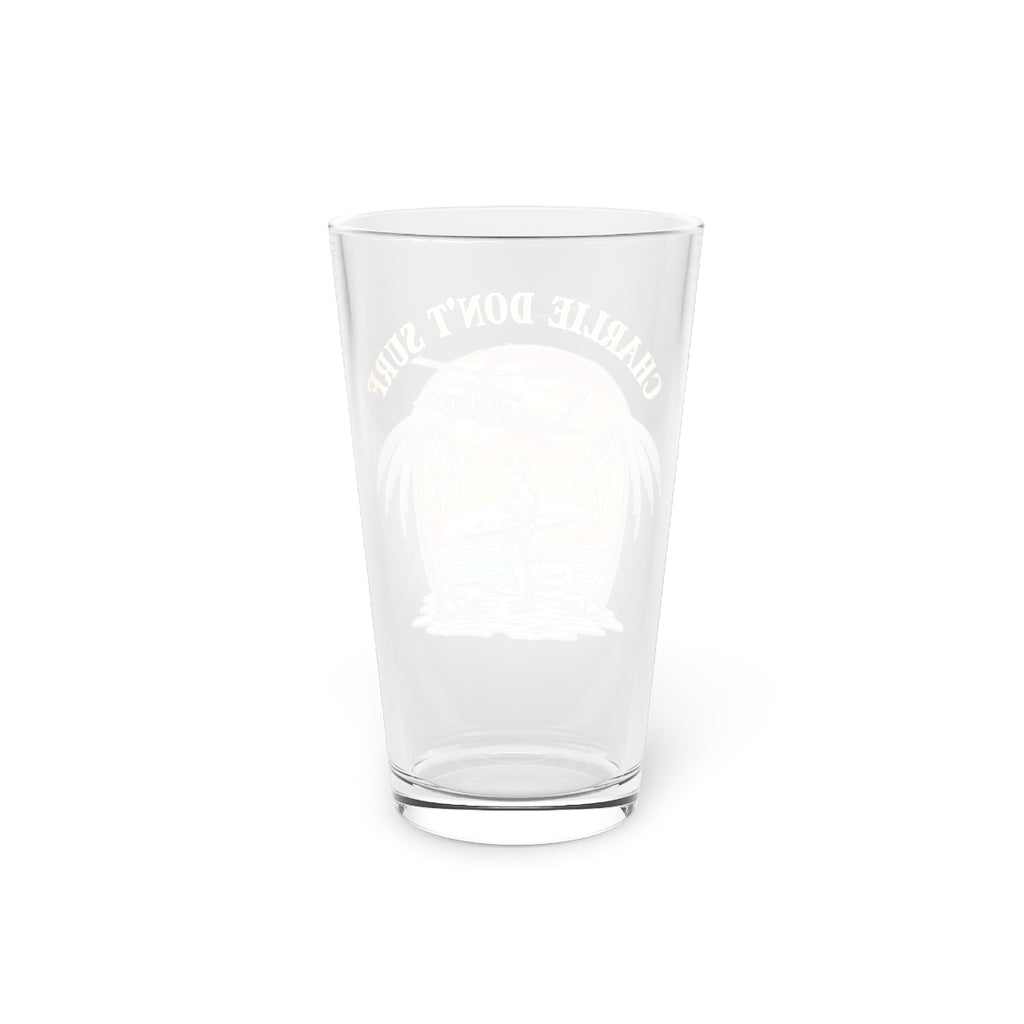 Charlie Don't Surf Pint Glass