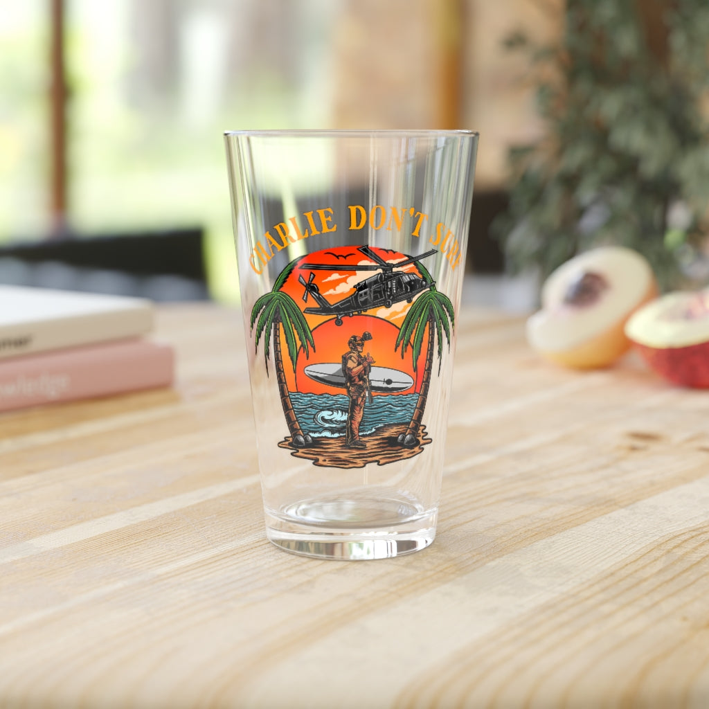 Charlie Don't Surf Pint Glass