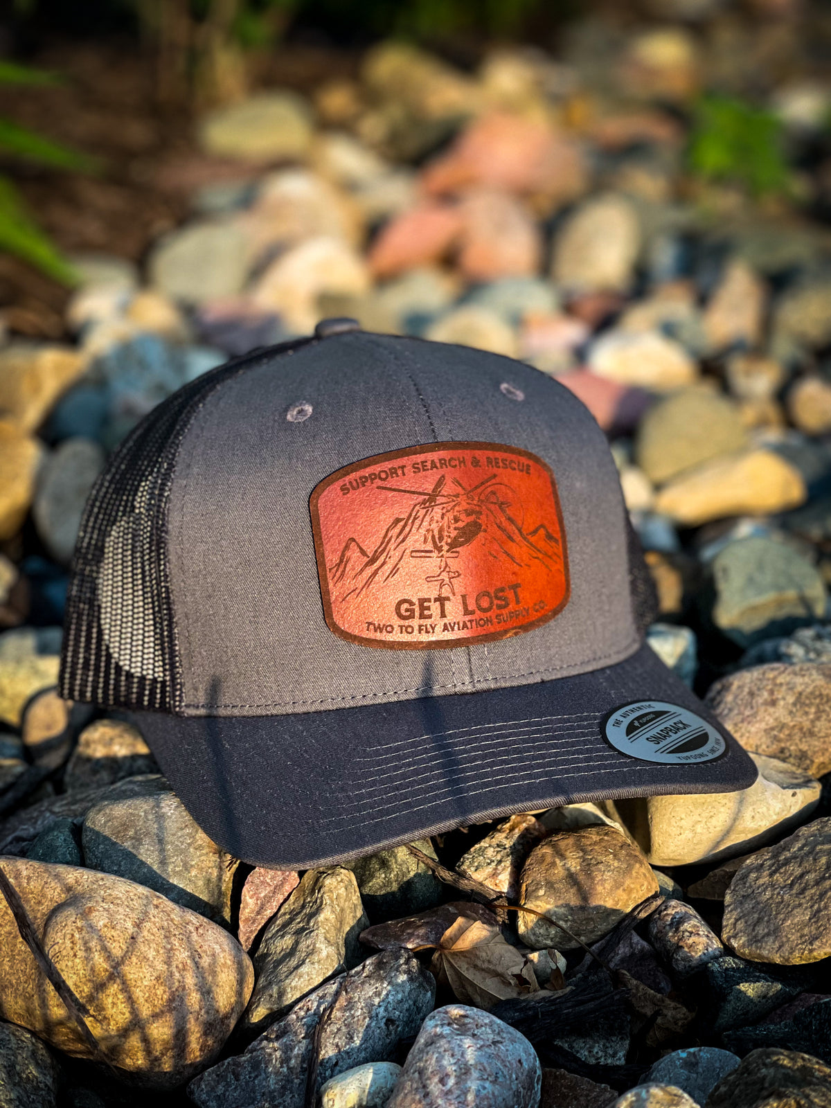 Get Lost V2 charcoal snapback trucker cap with leather Support Search & Rescue patch