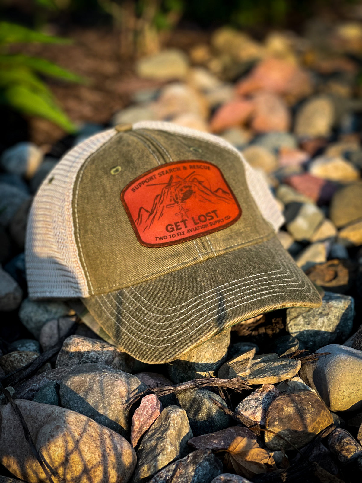 Get Lost V2 distressed olive green trucker cap with tan mesh and leather Support Search & Rescue patch
